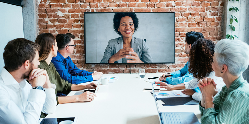 A diverse group of individuals are attending a meeting